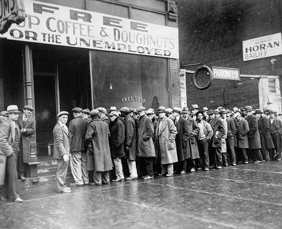 Unemployed men line up outside a Depression-era soup kitchen in Chicago, 1931.